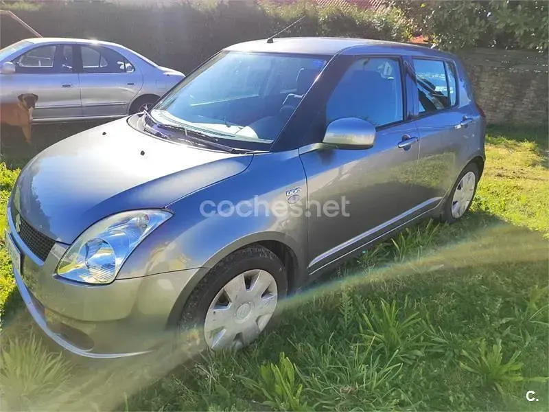 Usado Suzuki Swift GLX 69 CV (50 kW) 2007 Gris / plata Utilitario