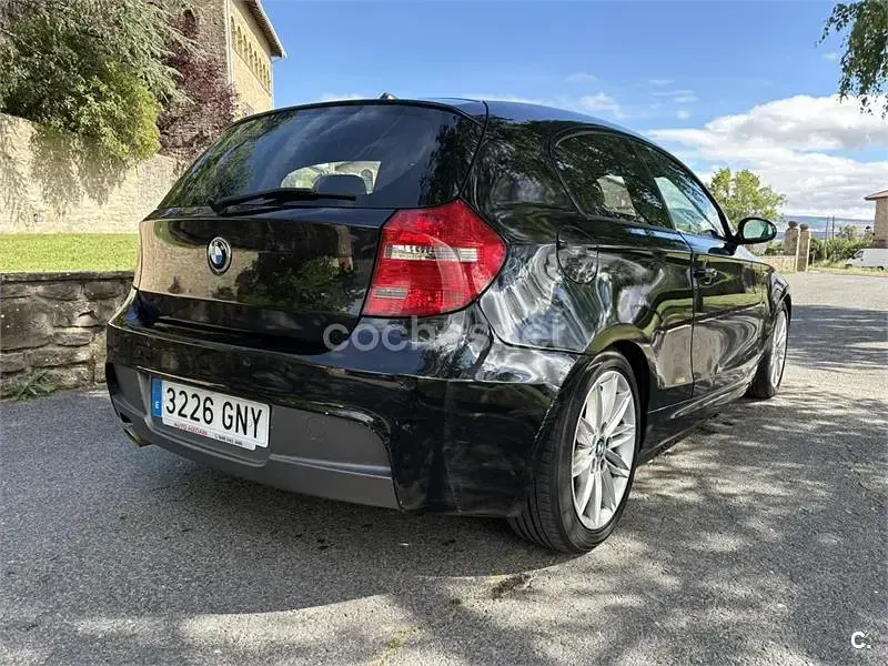 Usado BMW 116 115 CV (84 kW) 2009 Negro Utilitario