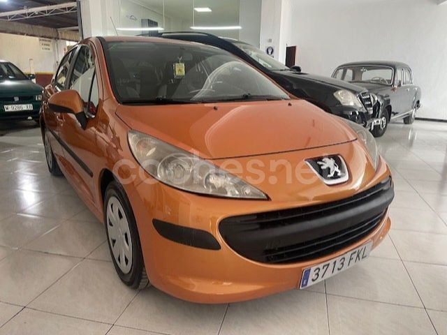 Usado Peugeot 207 70 CV (51 kW) 2007 Naranja Berlina