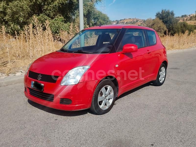 Rojo Usado 2009 Suzuki Swift GLX Berlina | 4499 € (Precio justo) - Imagen 1/4
