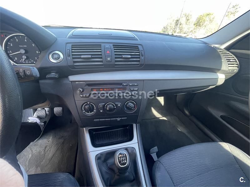 Usado BMW 116 122 CV (89 kW) 2009 Negro Utilitario