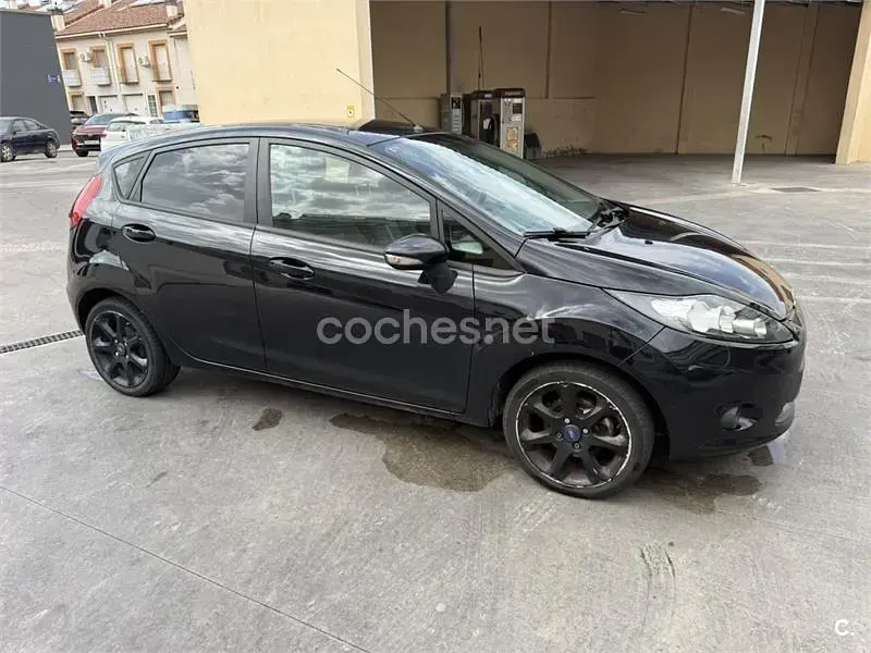 Usado Ford Fiesta Titanium 95 CV (69 kW) 2011 Negro Berlina