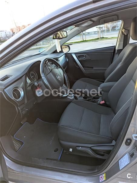 Usado Toyota Auris Hybrid Advance 136 CV (100 kW) 2014 Marrón Berlina