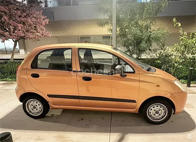 Usado Chevrolet Matiz 65 CV (47 kW) 2005 Naranja Utilitario