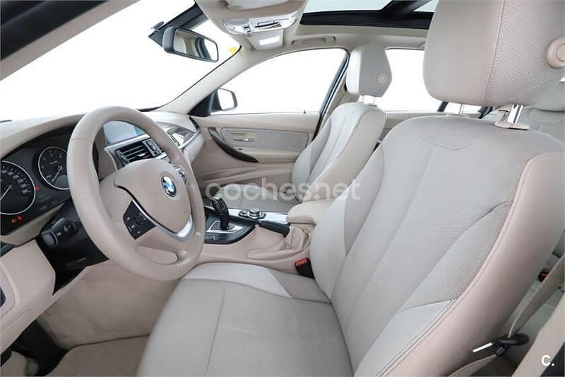 Usado BMW 320 184 CV (135 kW) 2015 Negro Familiar