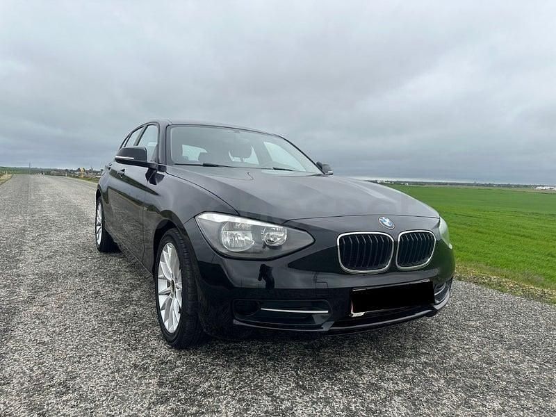 Usado BMW 114 Sport Line 102 CV (75 kW) 2012 Negro Utilitario