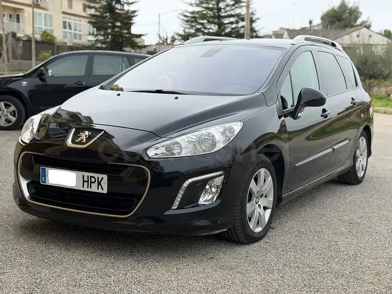 Usado Peugeot 308 SW Active 112 CV (82 kW) 2013 Negro Familiar