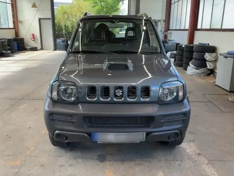 Usado Suzuki Jimny 86 CV (63 kW) 2006 Gris / plata SUV