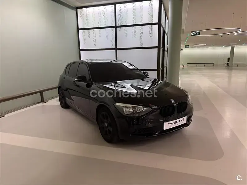 Usado BMW 116 136 CV (100 kW) 2012 Negro Utilitario
