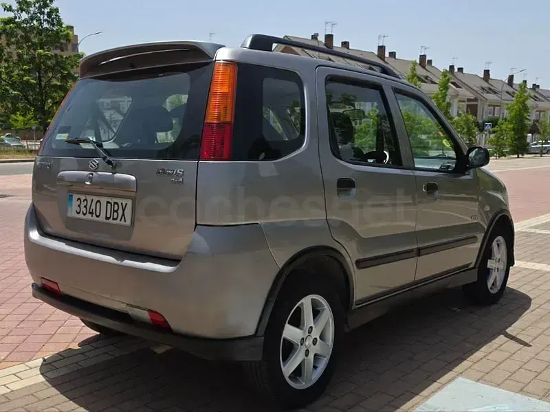 Usado Suzuki Ignis 99 CV (72 kW) 2005 Gris / plata Utilitario