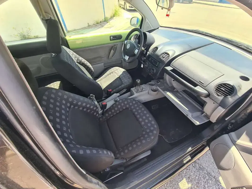 Usado VW Beetle 101 CV (74 kW) 2002 Negro Utilitario