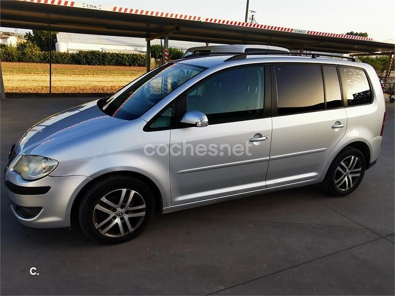 Gris / plata Usado 2007 VW Touran Edition Monovolumen | 4990 € (Precio justo) - Imagen 1/4