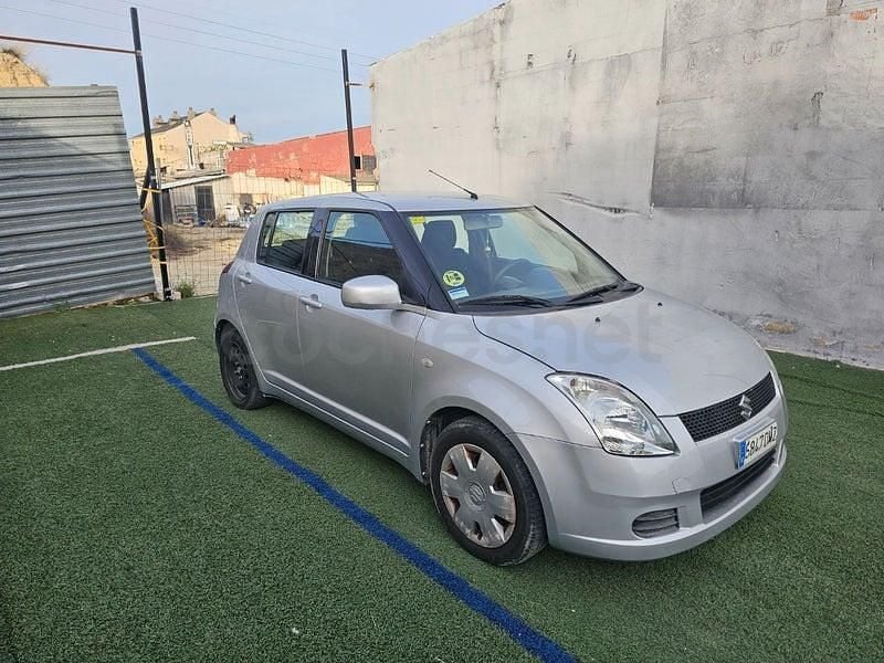 Usado Suzuki Swift GL 92 CV (67 kW) 2005 Gris / plata Utilitario