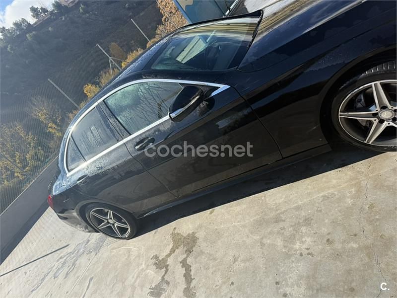 Usado Mercedes C180 AMG line 156 CV (114 kW) 2015 Negro Berlina