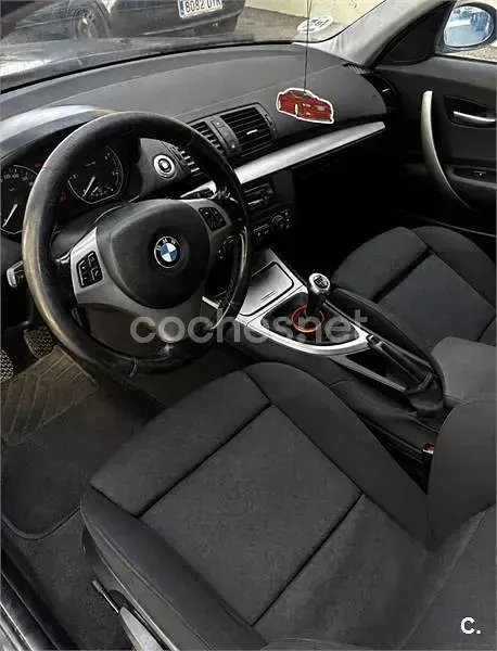 Usado BMW 120 163 CV (119 kW) 2007 Negro Utilitario