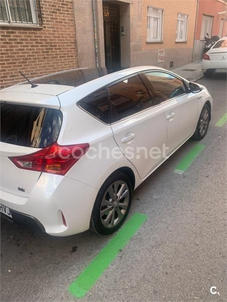 Blanco Usado 2014 Toyota Auris Hybrid Advance Berlina | 14.000 € (Un poco caro) - Imagen 1/4