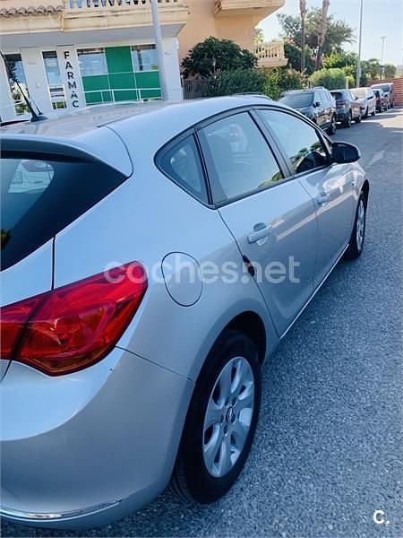 Usado Opel Astra Business 110 HP (80 kW) 2015 Cinzento Sedan