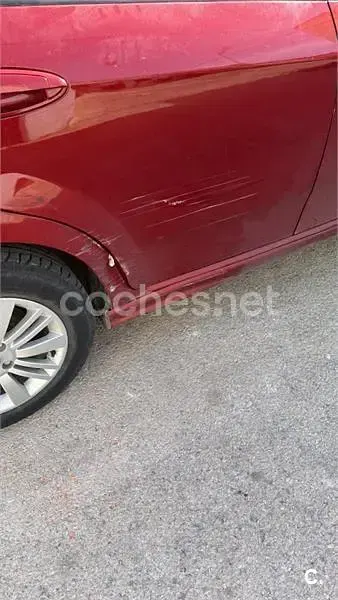 Usado Fiat Grande Punto Emotion 90 CV (66 kW) 2006 Granate Utilitario