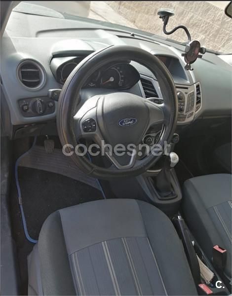 Usado Ford Fiesta Trend 68 CV (50 kW) 2009 Rojo Utilitario