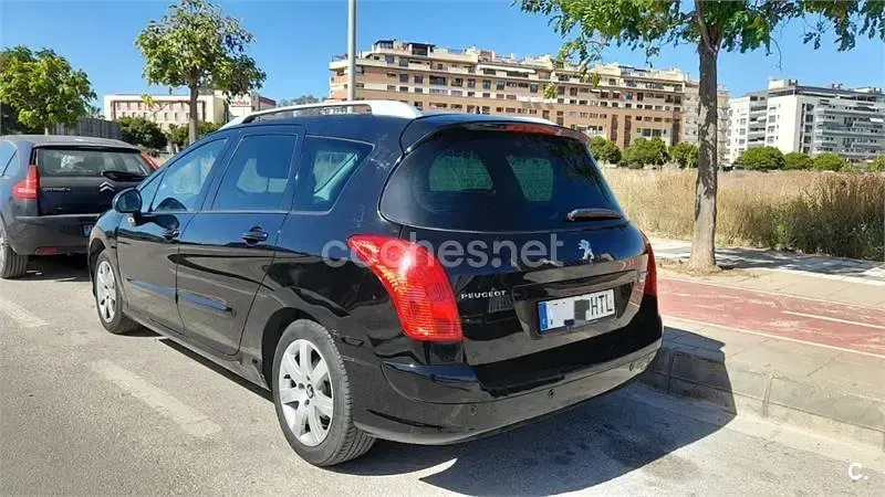 Usado Peugeot 308 SW Active 115 CV (84 kW) 2013 Negro Familiar