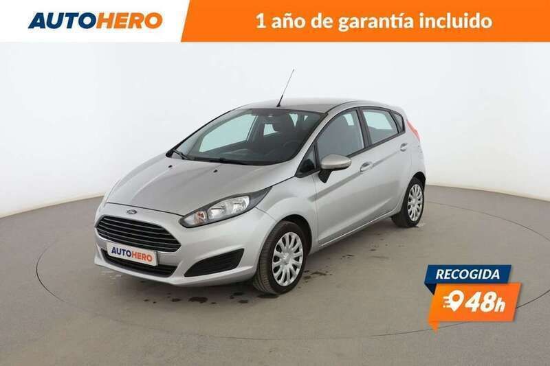 Amarillo Usado 2015 Ford Fiesta Trend Utilitario | 8099 € (Precio justo) - Imagen 1/3