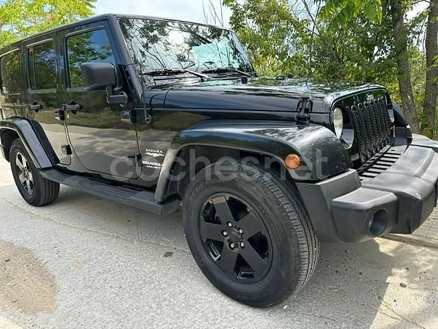 Negro Usado 2012 Jeep Wrangler Unlimited Sahara SUV | 26.900 € (Super precio) - Imagen 1/4