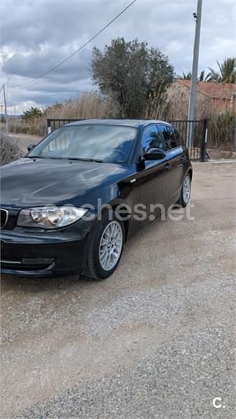 Usado BMW 116 122 CV (89 kW) 2009 Negro Utilitario