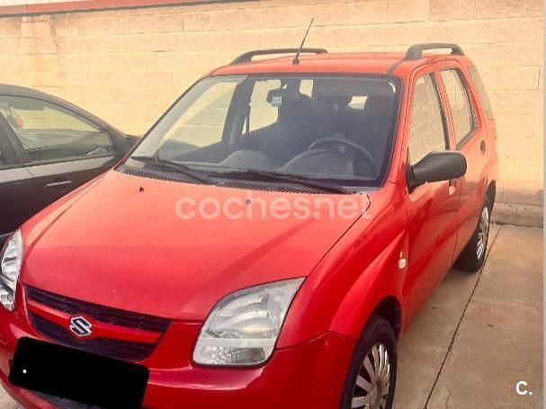 Usado Suzuki Ignis 69 CV (50 kW) 2004 Granate Berlina