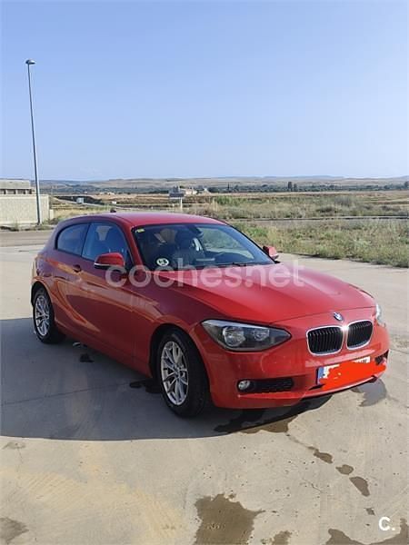 Rojo Usado 2014 BMW 116 Utilitario | 8500 € (Buen precio) - Imagen 1/4