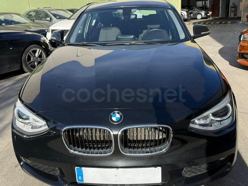 Usado BMW 118 Sport Line 170 CV (125 kW) 2012 Negro Utilitario