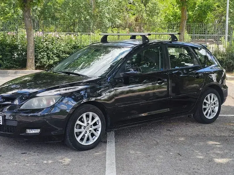 Usado Mazda 3 Active 109 CV (80 kW) 2009 Negro Berlina