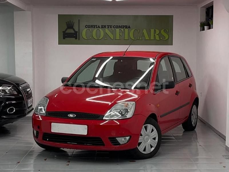Rojo Usado 2003 Ford Fiesta Ghia Berlina | 2990 € - Imagen 1/4