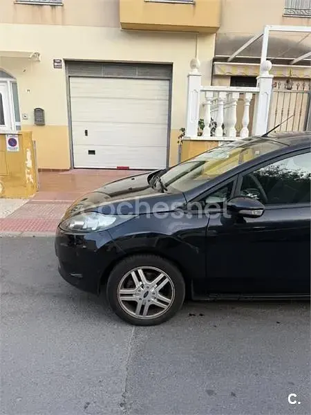 Usado Ford Fiesta Trend 70 CV (51 kW) 2012 Negro Berlina