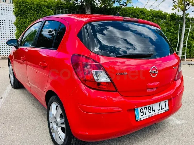 Usado Opel Corsa Selective 95 CV (69 kW) 2013 Rojo Utilitario