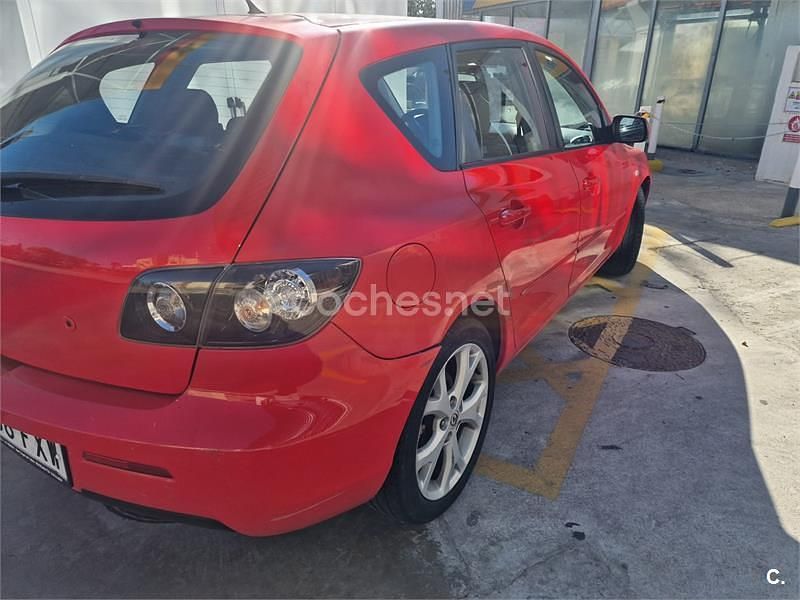Używany Mazda 3 Active 109 KM (80 kW) 2007 Czerwony Sedan/Limuzyna