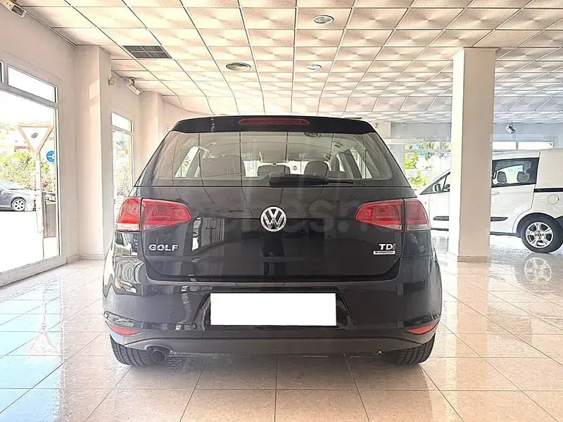 Usado VW Golf VII Advance 105 CV (77 kW) 2014 Negro Berlina