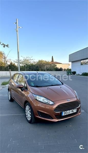 Naranja Usado 2013 Ford Fiesta Trend Utilitario | 6100 € (Precio justo) - Imagen 1/4