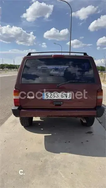 Usado Jeep Cherokee Sport 115 CV (84 kW) 2001 Granate SUV