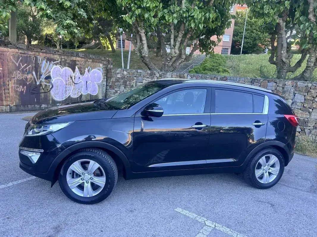 Usado Kia Sportage 116 CV (85 kW) 2012 Negro SUV