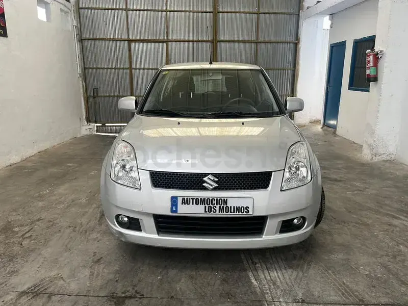 Usado Suzuki Swift GLX 92 CV (67 kW) 2005 Gris / plata Utilitario