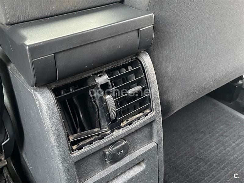 Usado VW Caddy Trendline 75 CV (55 kW) 2014 Granate Monovolumen