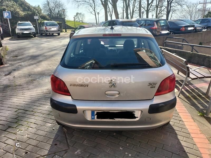 Usado Peugeot 307 90 CV (66 kW) 2004 Gris / plata Berlina