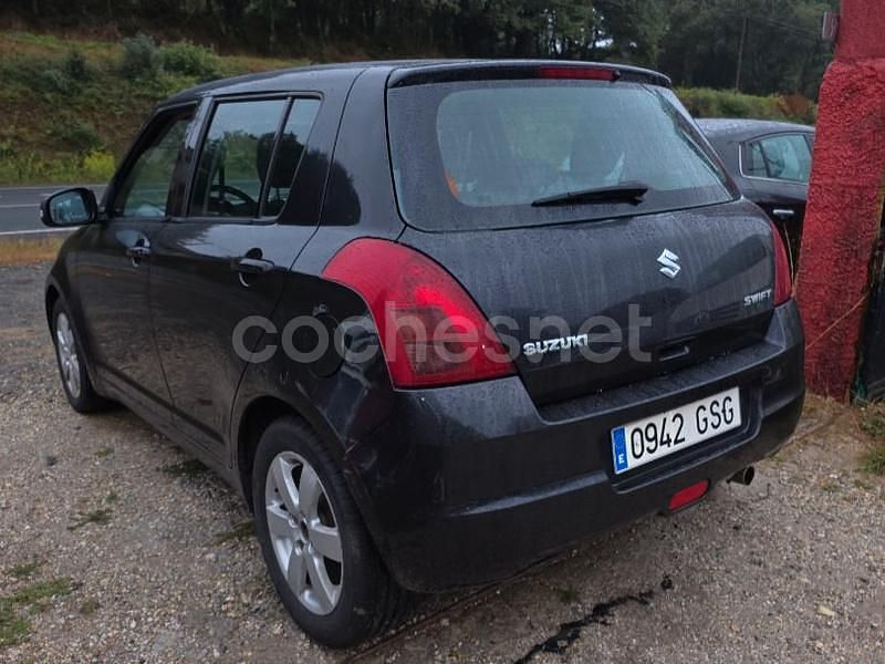 Usado Suzuki Swift GLX 92 CV (67 kW) 2010 Negro Berlina