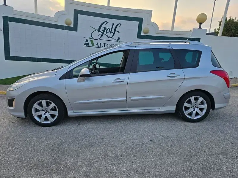 Usado Peugeot 308 SW Sportium 120 CV (88 kW) 2011 Gris / plata Familiar
