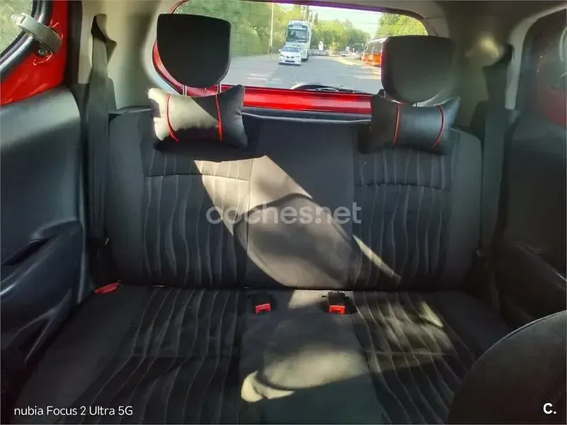 Usado Nissan Pixo Visia 68 CV (50 kW) 2009 Rojo Utilitario
