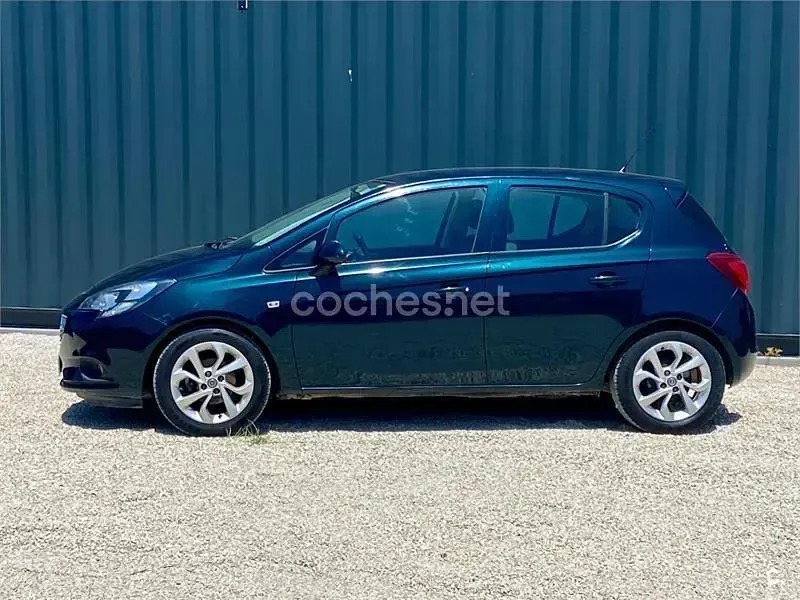 Usado Opel Corsa Selective 90 CV (66 kW) 2015 Verde Utilitario