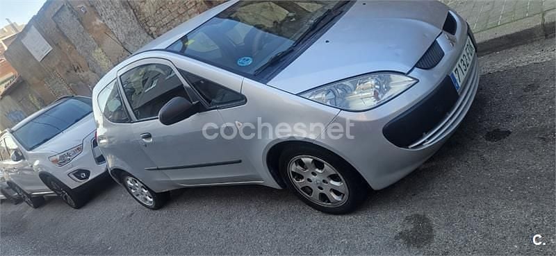 Usado Mitsubishi Colt Inform 75 CV (55 kW) 2007 Gris / plata Berlina