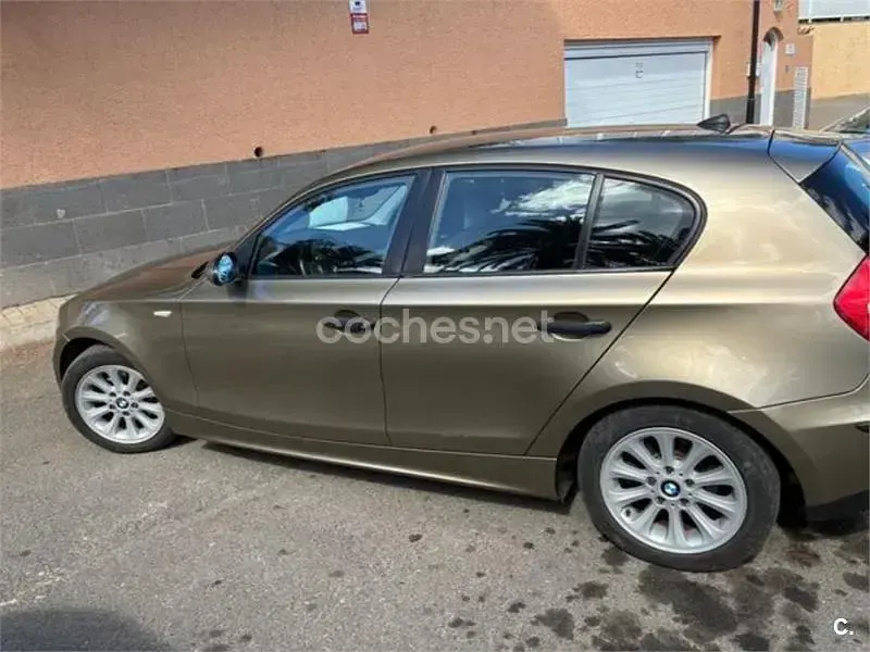 Używany BMW 118 129 KM (94 kW) 2007 Beżowy Hatchback