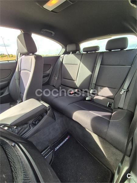 Usado BMW 118 143 CV (105 kW) 2007 Negro Utilitario