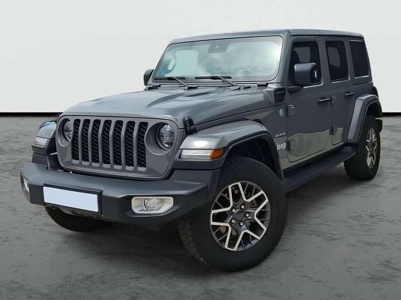 Gris Usado 2023 Jeep Wrangler Unlimited Sahara SUV | 51.490 € - Imagen 1/4